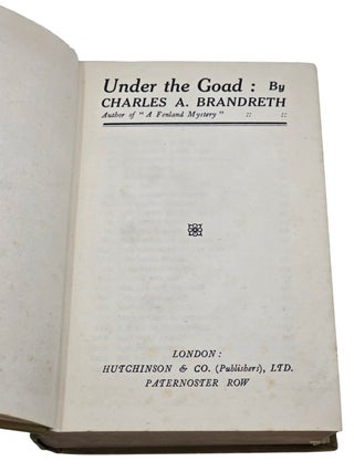 UNDER THE GOAD